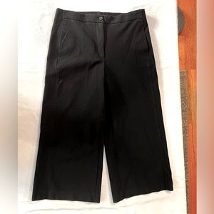 Wide leg, cropped black jeans.